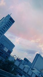 Low angle view of modern buildings against sky