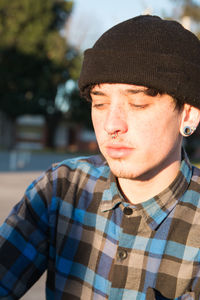 Portrait of handsome teenager outdoors