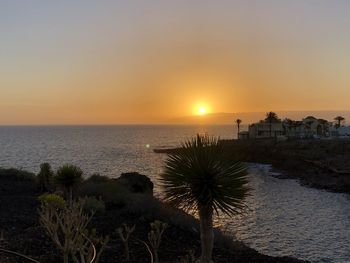 Scenic view of sea against sky during sunset