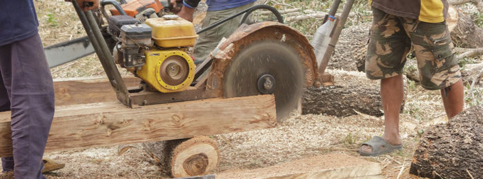 Low section of man working at construction site