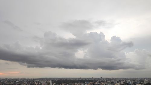 Aerial view of city against sky