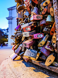 Padlocks hanging on railing