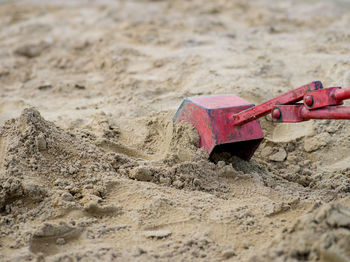 Close-up of toy on sand