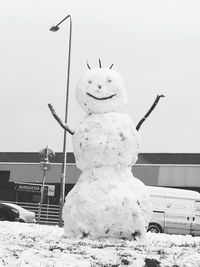 Statue against sky during winter