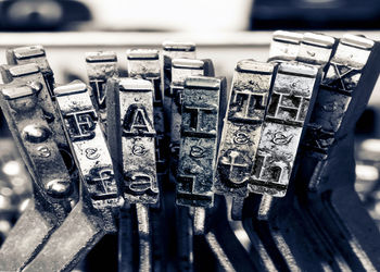 Close-up of machine part on table