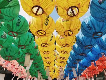 Low angle view of lanterns hanging in row