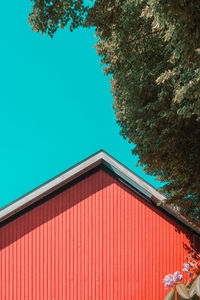 Low angle view of building against blue sky