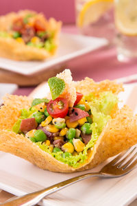 Close-up of food served on table