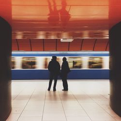 Blurred motion of train at subway station