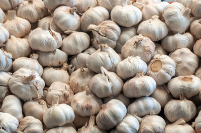 Full frame shot of onions for sale at market