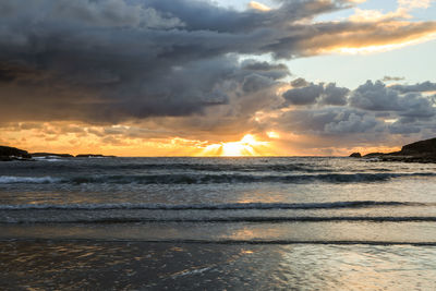 Scenic view of sea against sky during sunset