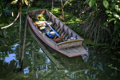 High angle view of boat floating on lake