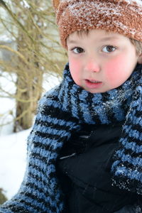 Close-up portrait of boy wearing warm clothing during winter