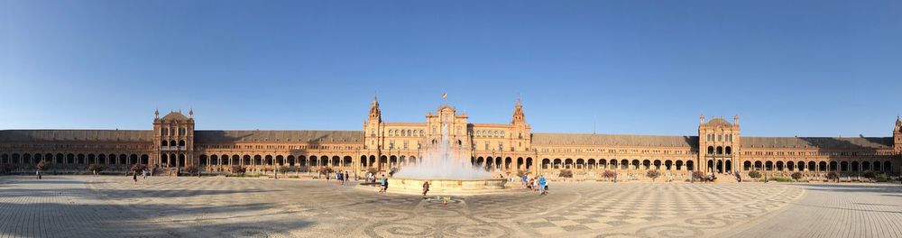 View of historical building against clear blue sky