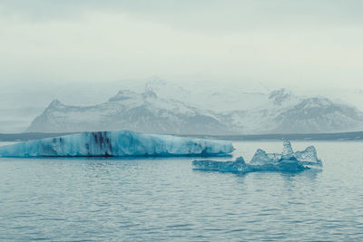 Ice pieces in northern sea landscape photo