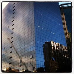 Low angle view of modern building against sky