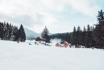 Scenic view of snow field against sky