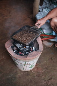 High angle view of man preparing food