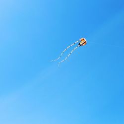  kite flying against clear blue sky