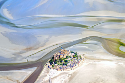 Aerial view of town amidst landscape 
