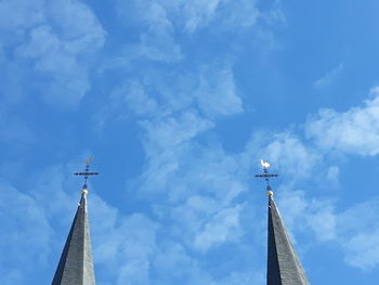 Low angle view of traditional building against blue sky