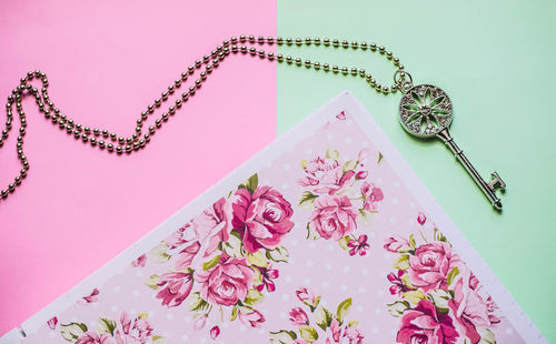 Close-up of pink flower on table