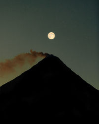 Scenic view of desert against sky at night