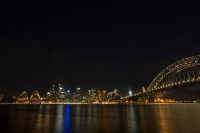 Sydney city at night with beautiful light and reflection.sydney opera house.long exposure shot.