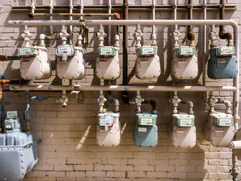 Electric meters attached on wall