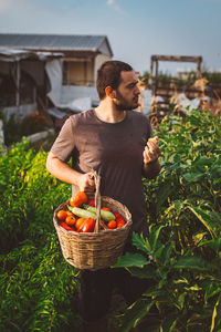 Man holding ice cream in basket