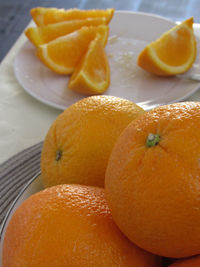 Close-up of orange slice in plate