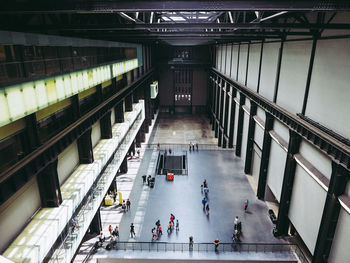 High angle view of people walking in illuminated city