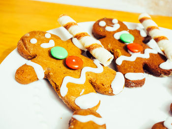 Close-up of gingerbread men on table