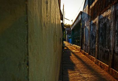 Walkway amidst buildings