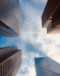 Low angle view of modern buildings against sky