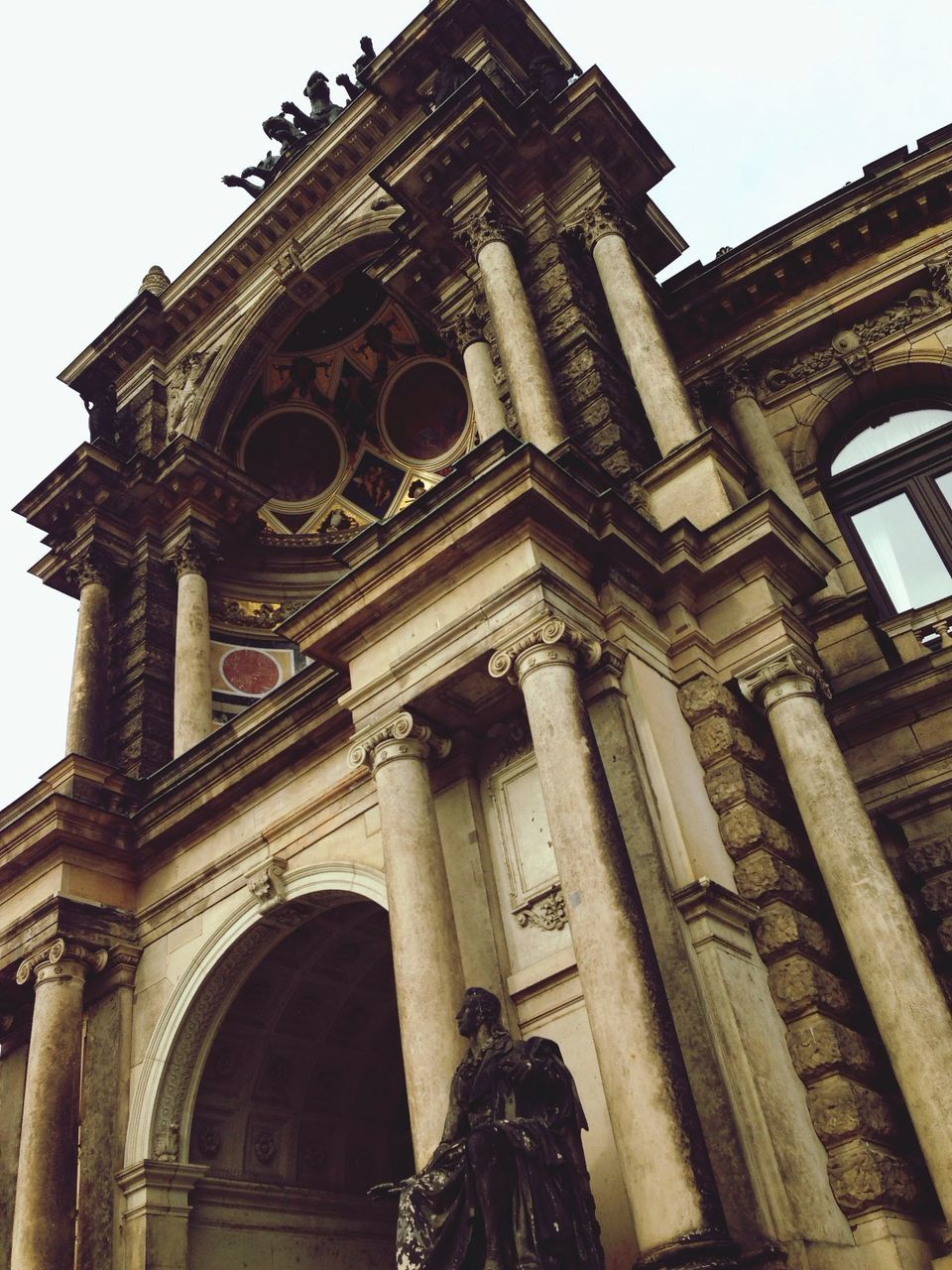 architecture, built structure, building exterior, low angle view, history, place of worship, clear sky, religion, old, church, spirituality, the past, famous place, historic, ancient, travel destinations, building, arch, architectural column