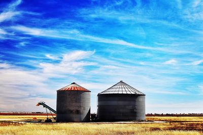 Corn cribs in the texas plains with blue sky