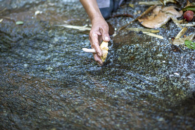 Person on wet rock