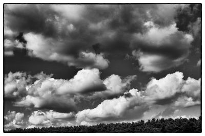 Panoramic shot of field against sky