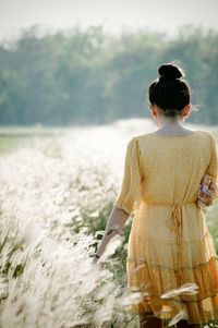 Woman walking on field