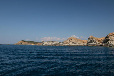 Scenic view of sea against clear blue sky