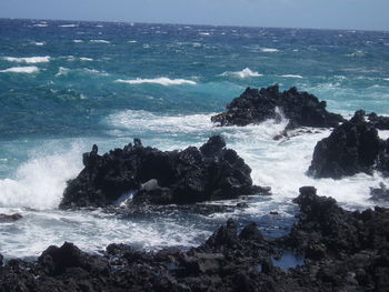 Scenic view of sea against clear sky