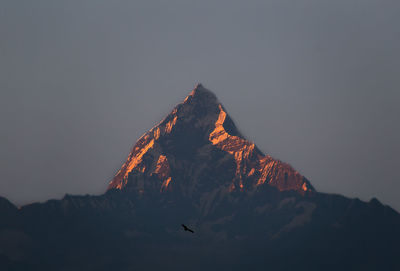 Scenic view of mountain against sky at night