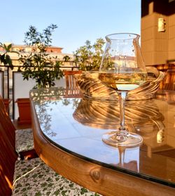 Glass of wine on table in restaurant