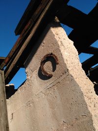 Low angle view of built structure against blue sky