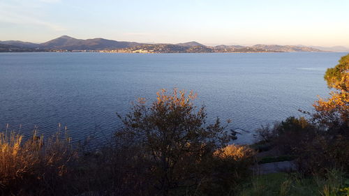 Scenic view of sea against sky at sunset