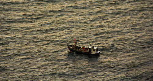 High angle view of boat sailing on sea