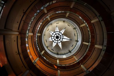 Directly below shot of clock in building