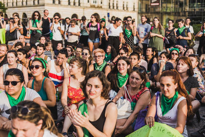 Group of people enjoying at music concert