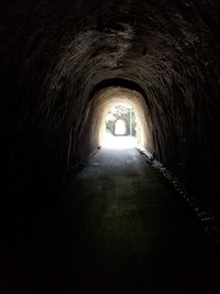 Empty corridor in tunnel